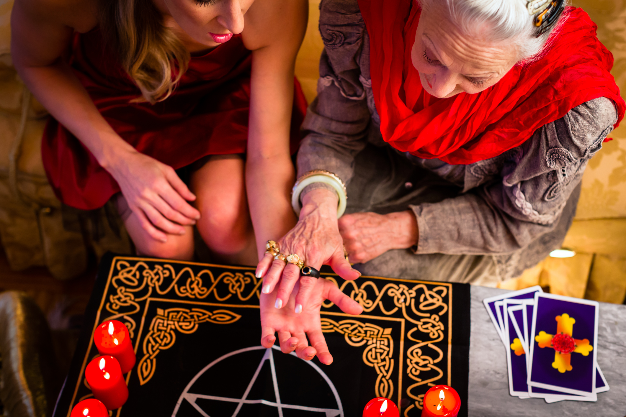 Psychic practitioner explaining clairvoyant, intuitive and medium services