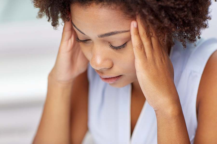 Person pausing at home to identify emotions and set compassionate boundaries