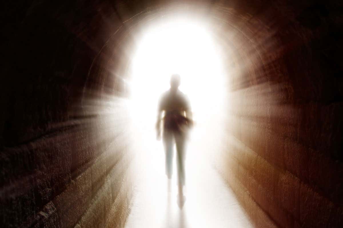 Symbolic sky and light representing diverse beliefs about the afterlife